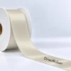 Ruban satin personnalisé écru 38 mm sur bobine, texte DirectRuban imprimé en noir